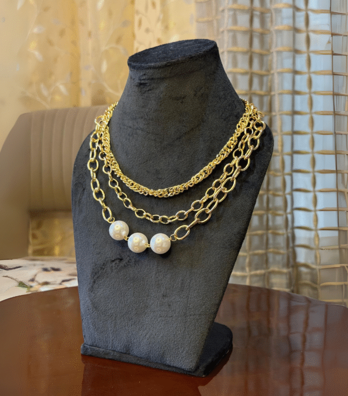 Opulent Layered Links With Pearls